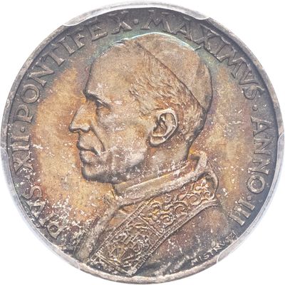 une vieille pièce de monnaie sur laquelle figure le portrait d'un homme