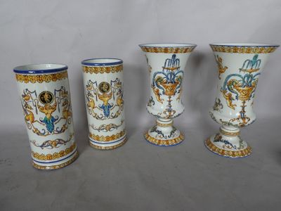 three vases with designs on them are sitting on a table