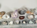 many different types of rocks and stones on a table