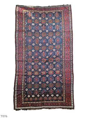 a blue and red rug on a white background