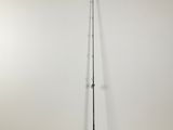 a black and white photo of a pole in a room