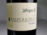 a bottle of wine that is sitting on a table
