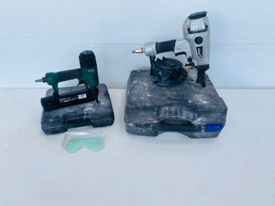 two tools that are sitting on top of a table