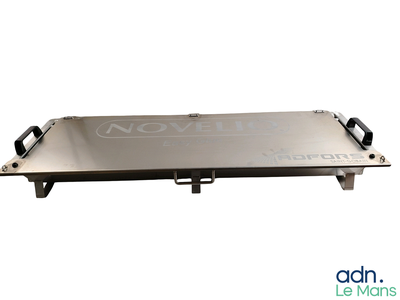 an image of a metal tray with a logo on it