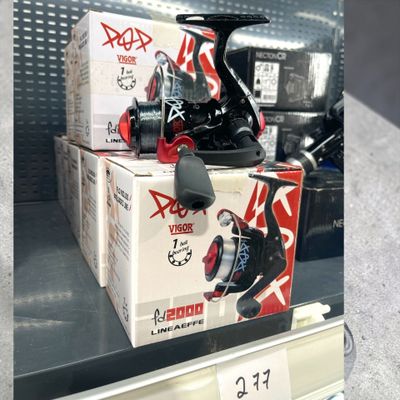 a box of fishing reels on display in a store