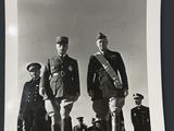 black and white photograph of a group of men in military uniforms