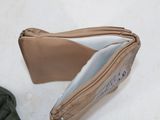 a purse that has been left open on the floor