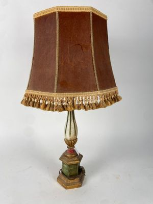 an image of a table lamp with a brown shade on it