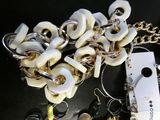 a bunch of jewelry that is laying on a table