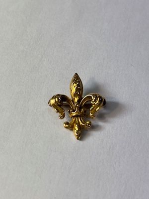 Broche fleur de lys or 14K tige en acier 1,70grs
