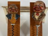 two wine openers with a man and a woman on them