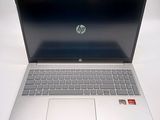 a laptop that is sitting on a white table