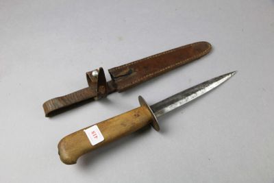 two knives that are sitting next to each other on a table