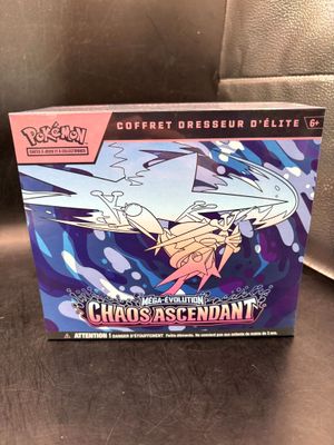 a close up of a box of pokemon cards on a table