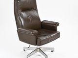 brown leather office chair with casteors and foot rest