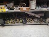 a shelf full of shoes and other items in a room