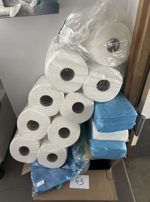 several rolls of toilet paper are stacked on top of each other