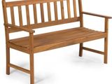a wooden bench that is sitting on a white surface