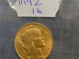 a close up of a coin in a bag on a table
