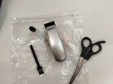 a pair of scissors and a pair of scissors on a table
