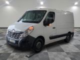 la photo d'une camionnette blanche garée dans un garage
