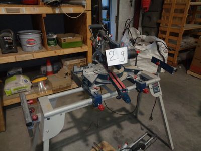 a picture of a workbench in a garage with tools on it