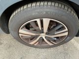 a close up of a tire on a car ' s rim
