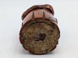 a close up of a cigar with a leather case on it