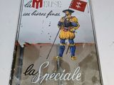 un panneau sur lequel on peut lire « La Spéciale », avec un homme tenant un drapeau