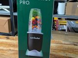 a box of nutribullet pro sitting on a wooden table