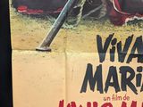 movie poster of a baseball player holding a bat on a baseball field