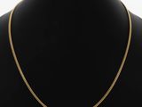 a gold chain necklace on a mannequin mannequin mannequin mannequin mannequin mannequin mannequin mannequin manne