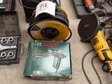 a lot of tools that are laying out on the floor