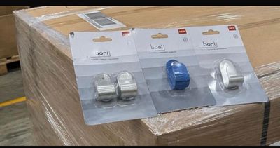 two packages of items sitting on top of a pallet