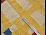 an image of a close up of a piece of cloth with a needle