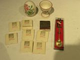 many cards and a tea cup on the table