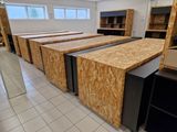 a room that has a bunch of wooden cabinets in it