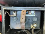 a small box with a battery inside of it