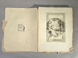 un livre ouvert sur lequel figure l'image d'un homme et d'un chien