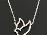 a white gold and diamond dove pendant on a chain