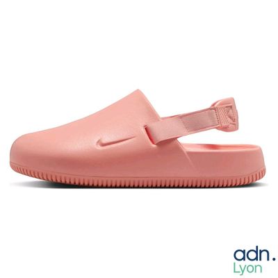 the pink slippers are on a white background with a white background