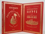 two red book covers with gold trimming on them and a picture of a woman holding a bird