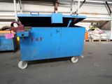 a blue box that is sitting in a garage