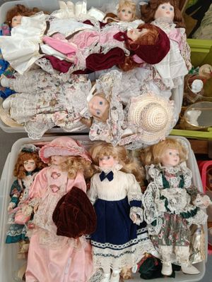 a lot of dolls that are in a box