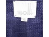 a close up of a label on a blue sweater