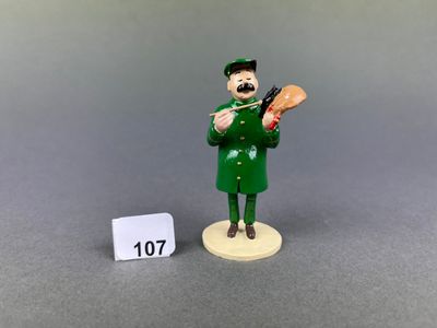 a figurine of a man in a green uniform holding a baseball bat