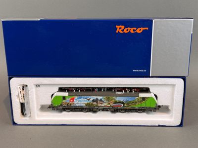 Coffret de train Rocc contenant un train sur les rails