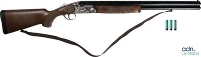 a close up of a rifle with a gun attached to it