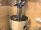 a metal object that is on display in a glass case