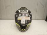 a close up of a helmet on a table with a tag